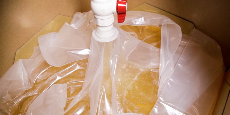 picture of cooking oil in big transparent plastic