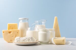 Variety of dairy products on blue background